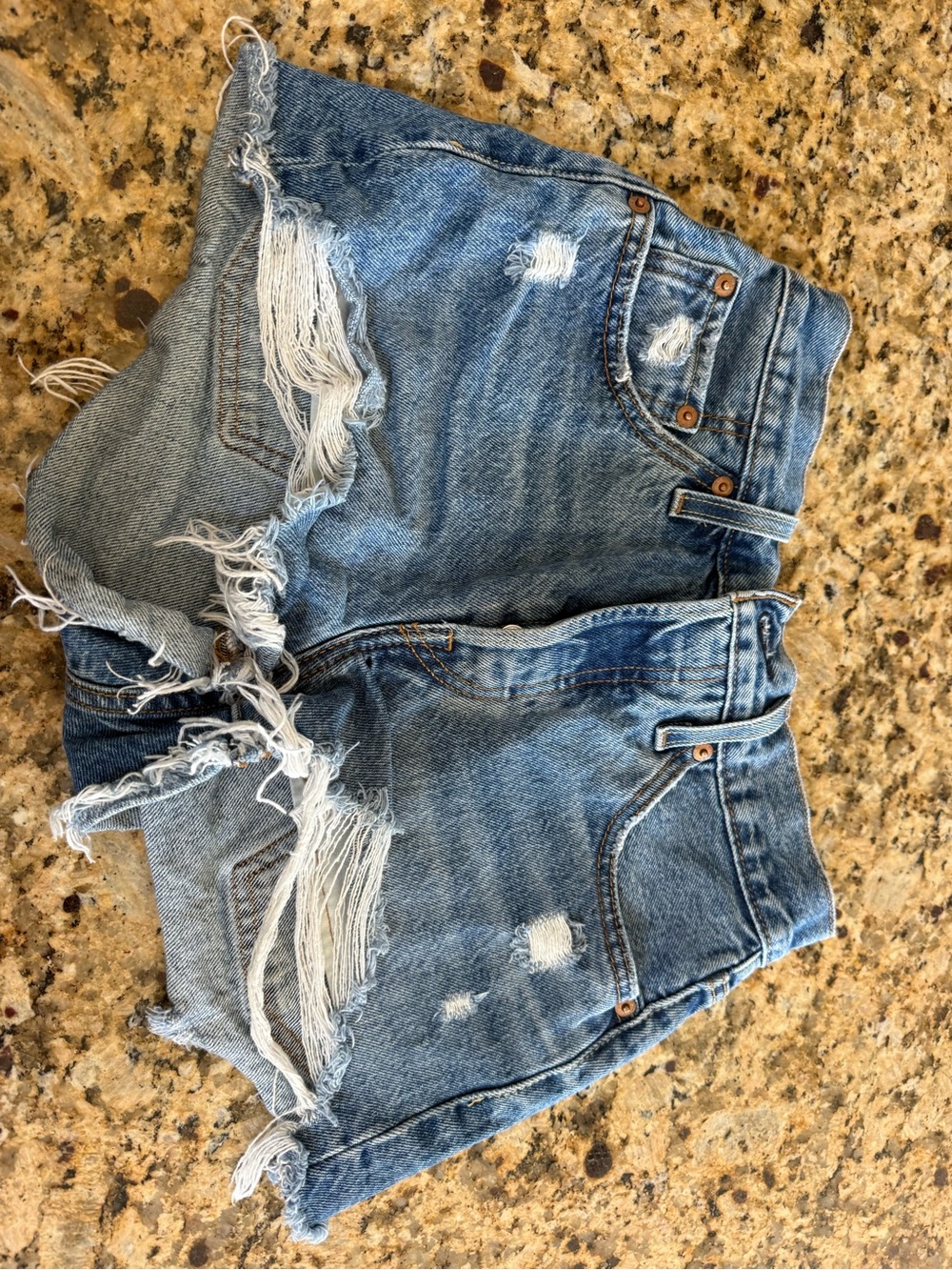 Levi's Distressed Light Blue Denim Cutoff Shorts